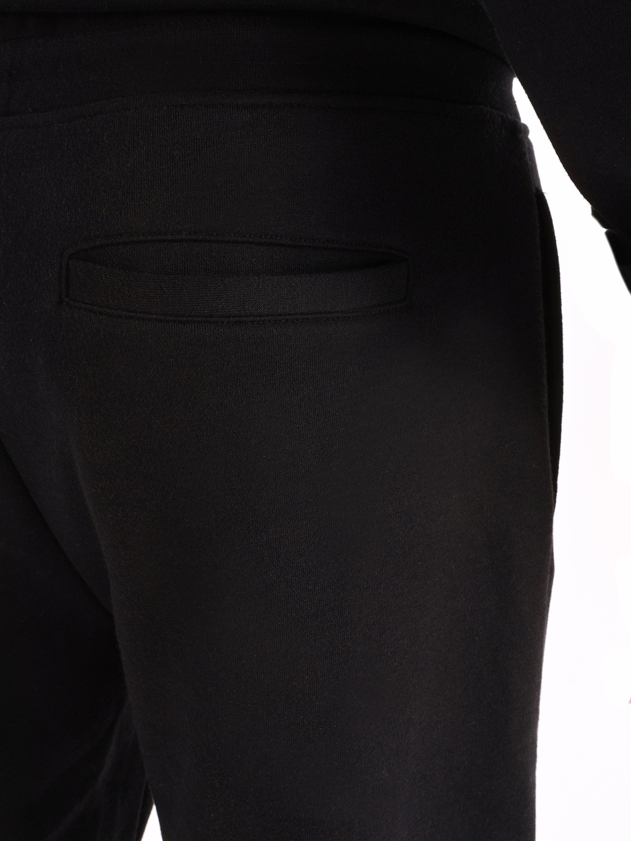 Afficher les détails de Noir HOMME Pantalon de survêtement