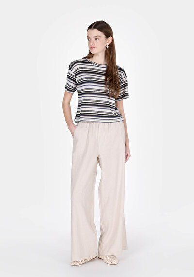 Image de Pantalon Beige Wide Leg High Rise En Uni Regular Fit Femme
