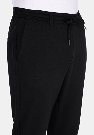 Afficher les détails de Pantalon Noir Uzun Medium Rise En Uni Slim Fit Homme