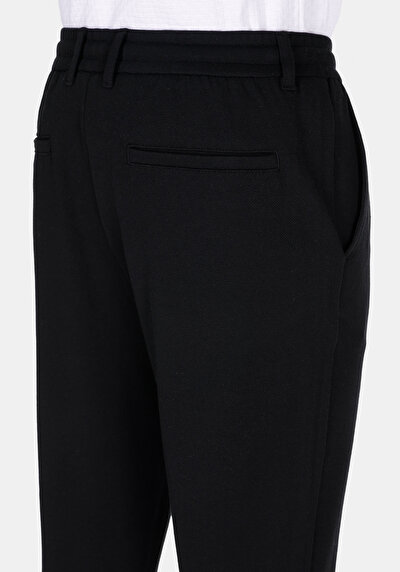 Afficher les détails de Pantalon Noir Uzun Medium Rise En Uni Slim Fit Homme