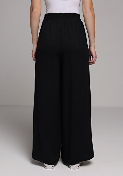 Image de Pantalon Noir Wide Leg High Rise En Ratière Regular Fit Femme