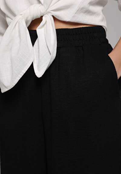 Image de Pantalon Noir Wide Leg High Rise En Ratière Regular Fit Femme