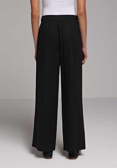Image de Pantalon Noir Wide Leg High Rise En Uni Regular Fit Femme