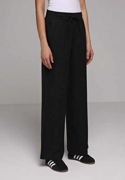 Image de Pantalon Noir Wide Leg High Rise En Uni Regular Fit Femme
