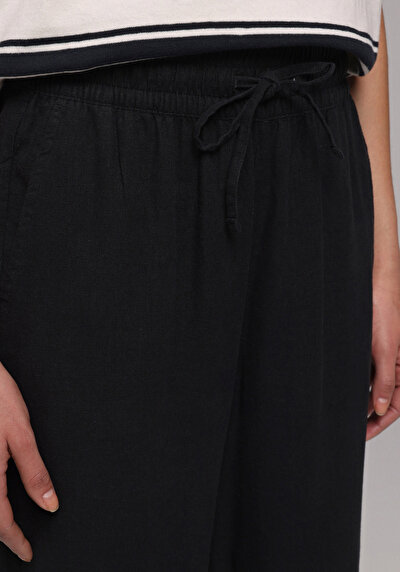 Image de Pantalon Noir Wide Leg High Rise En Uni Regular Fit Femme