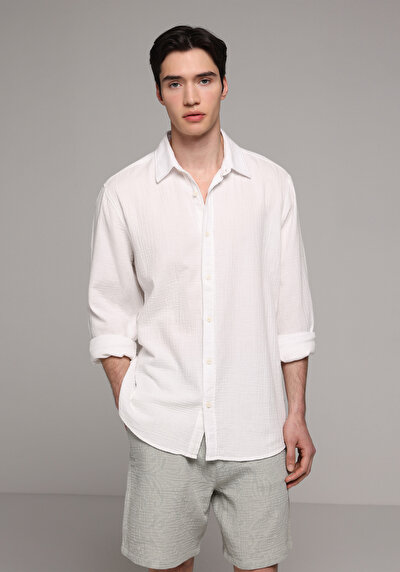 Afficher les détails de Chemise À Manches Longues Blanc Relaxed Fit Droit Tissu Froissé Homme