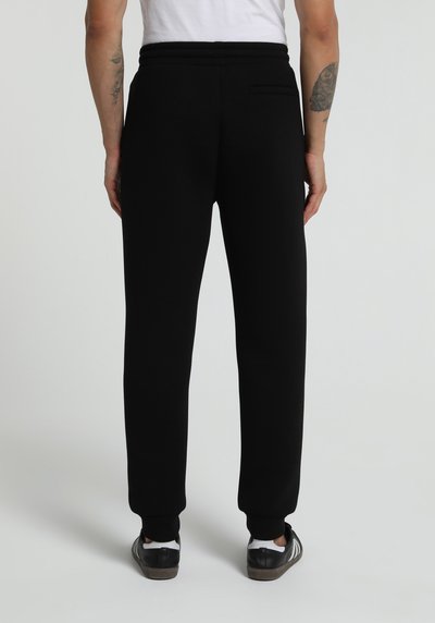 Image de Pantalon De Survêtement Noir Regular Fit Homme