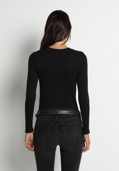Image de T-shirt À Manches Courtes Noir Slim Fit  Femme