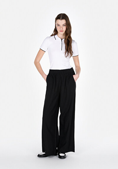 Image de Pantalon Noir Wide Leg High Rise En Uni Regular Fit Femme