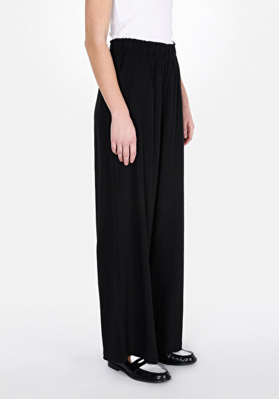 Image de Pantalon Noir Wide Leg High Rise En Uni Regular Fit Femme