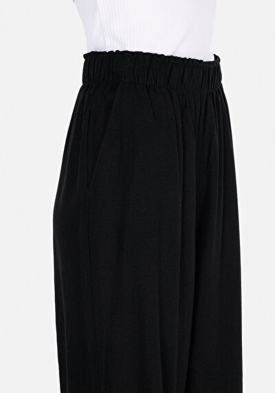 Afficher les détails de Pantalon Noir Wide Leg High Rise En Uni Regular Fit Femme