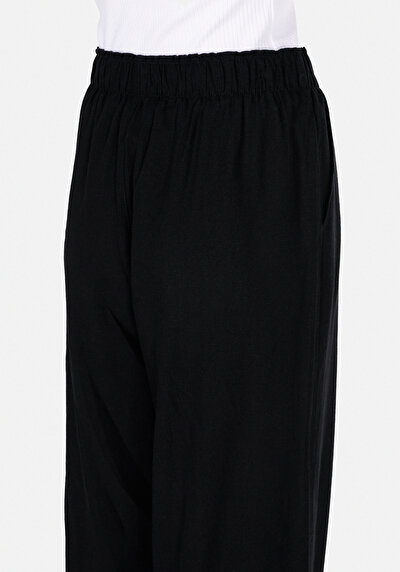 Afficher les détails de Pantalon Noir Wide Leg High Rise En Uni Regular Fit Femme